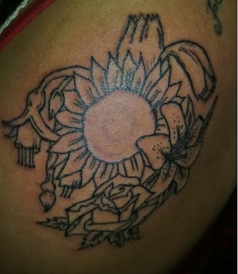 Sunflower Tattoo On Ribs