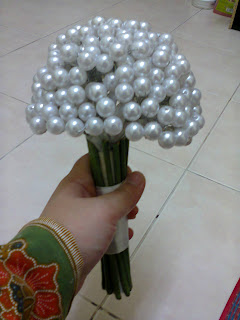 white pearl hand bouquet