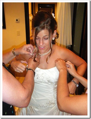 putting on necklace
