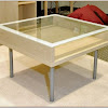 Coffee Table With Glass Display Top : 1 - Stacked book coffee table with glass top display and 2 drawers.