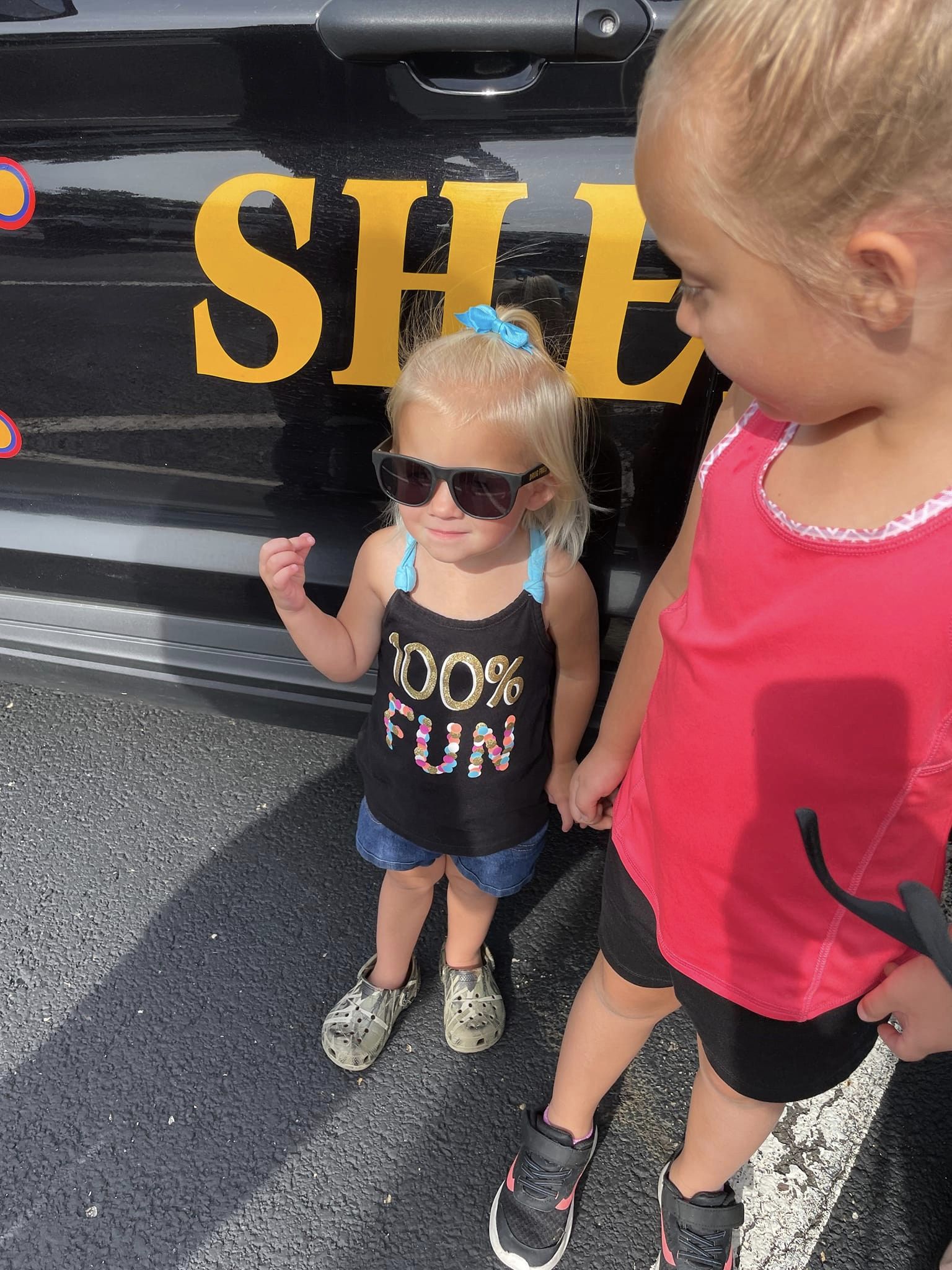 little girl wearing sunglasses