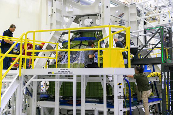 The Orion crew module that will fly on Artemis 4 undergoes construction inside the Neil A. Armstrong Operations and Checkout Building at NASA's Kennedy Space Center in Florida...on May 26, 2023.