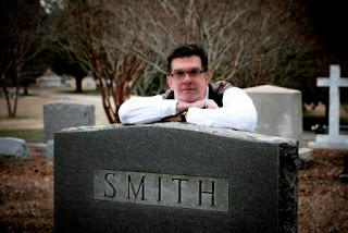 photo of author Thomas Smith standing in a graveyard