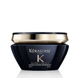 The Kerastase Chronologiste Masque Intense Regenerant container, showcasing its rich, creamy texture, aimed at deeply conditioning and revitalizing hair.