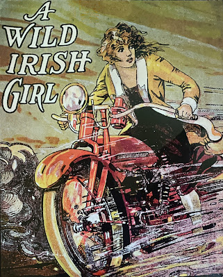 Poster of woman riding a motorcycle.