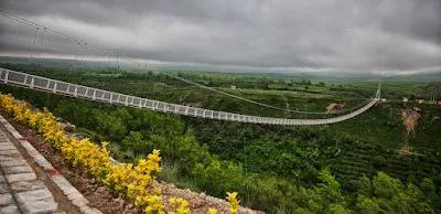 Meshgin shahr Suspension Bridge in Ardabil province, a record-breaking 365 meters long and two meters wide, is being constructed on the Khiavchai River