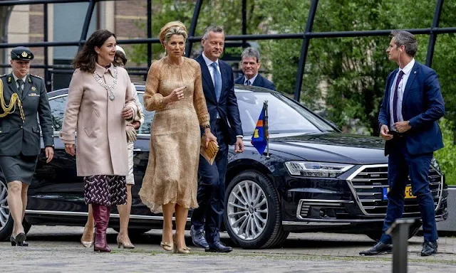 Queen Maxima wore a midi dress by Natan, Edouard Vermeulen. Salvatore Ferradamo flower heel shoe. Fabienne Delvigne Hat