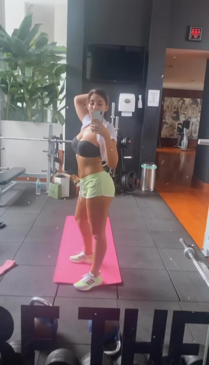 Gossips: Nora Fatehi flaunts saxy curves in sports bra and shorts as she sweats it call at the gym