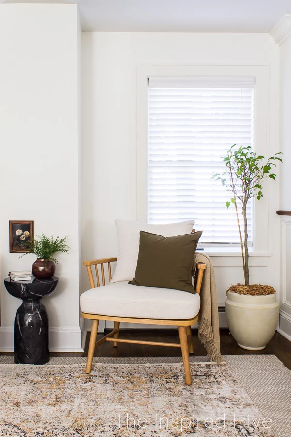 Spindle chair next to weeping fig ficus tree