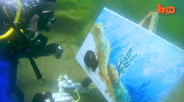 http://www.funmag.org/video-mag/mix-videos/underwater-artist/