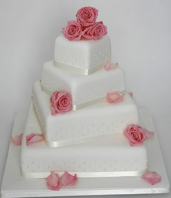 square wedding cakes flowers on top