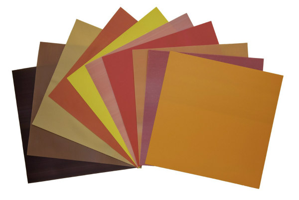 assortment of autumn colored square paper sheets