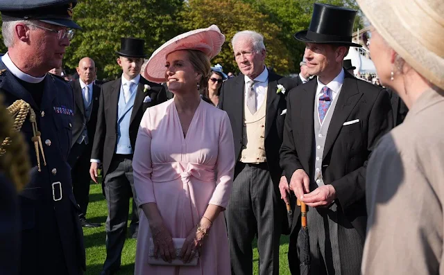 Duchess of Edinburgh wore a salmon pink wrap dress by Suzannah. Princess Anne floral print dress, Duchess of Gloucester gray dress