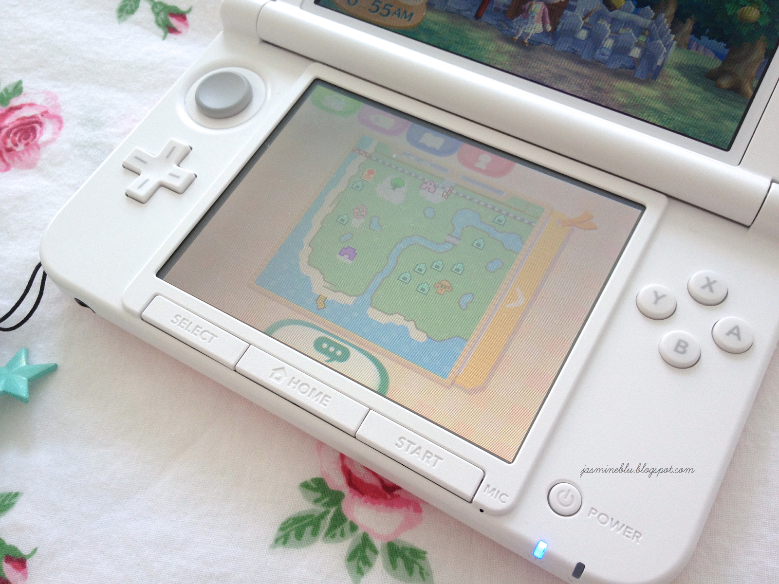 bottom screen, this is the touch screen one. Playing animal crossing ...