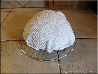 crusty bread wrapped in t-towel