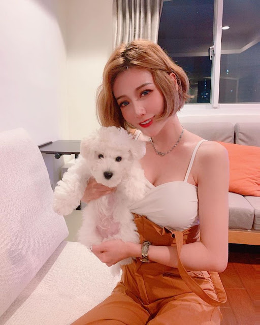 cute Asian girl with her pet