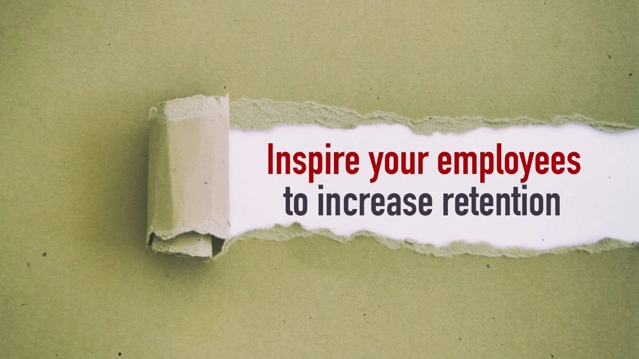 Inspire your employees to increase retention written under torn paper.