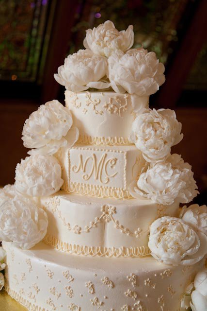 And th e wedding cake was just beautiful with the white peonies draping down