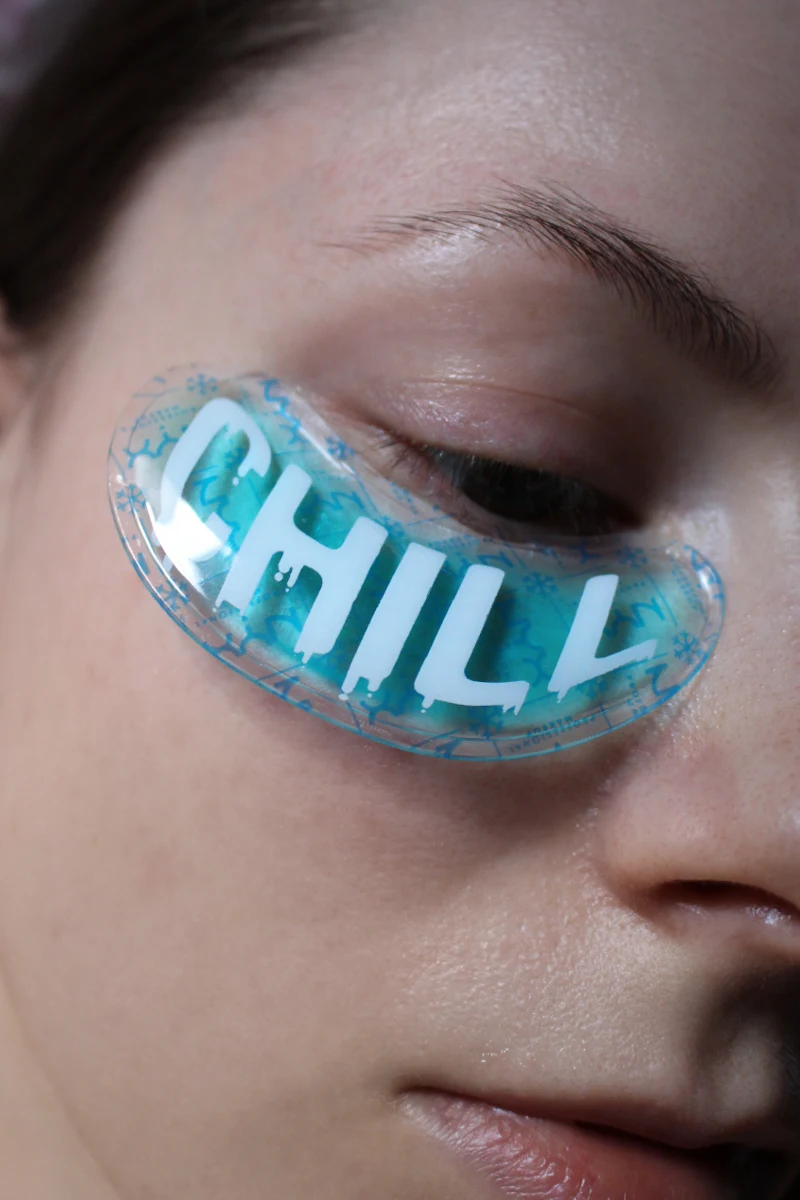 close-up of woman's face with silicone under eye patches on the skin