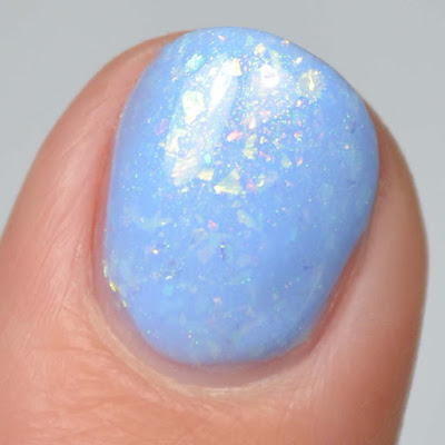 periwinkle blue nail polish with flakies swatch