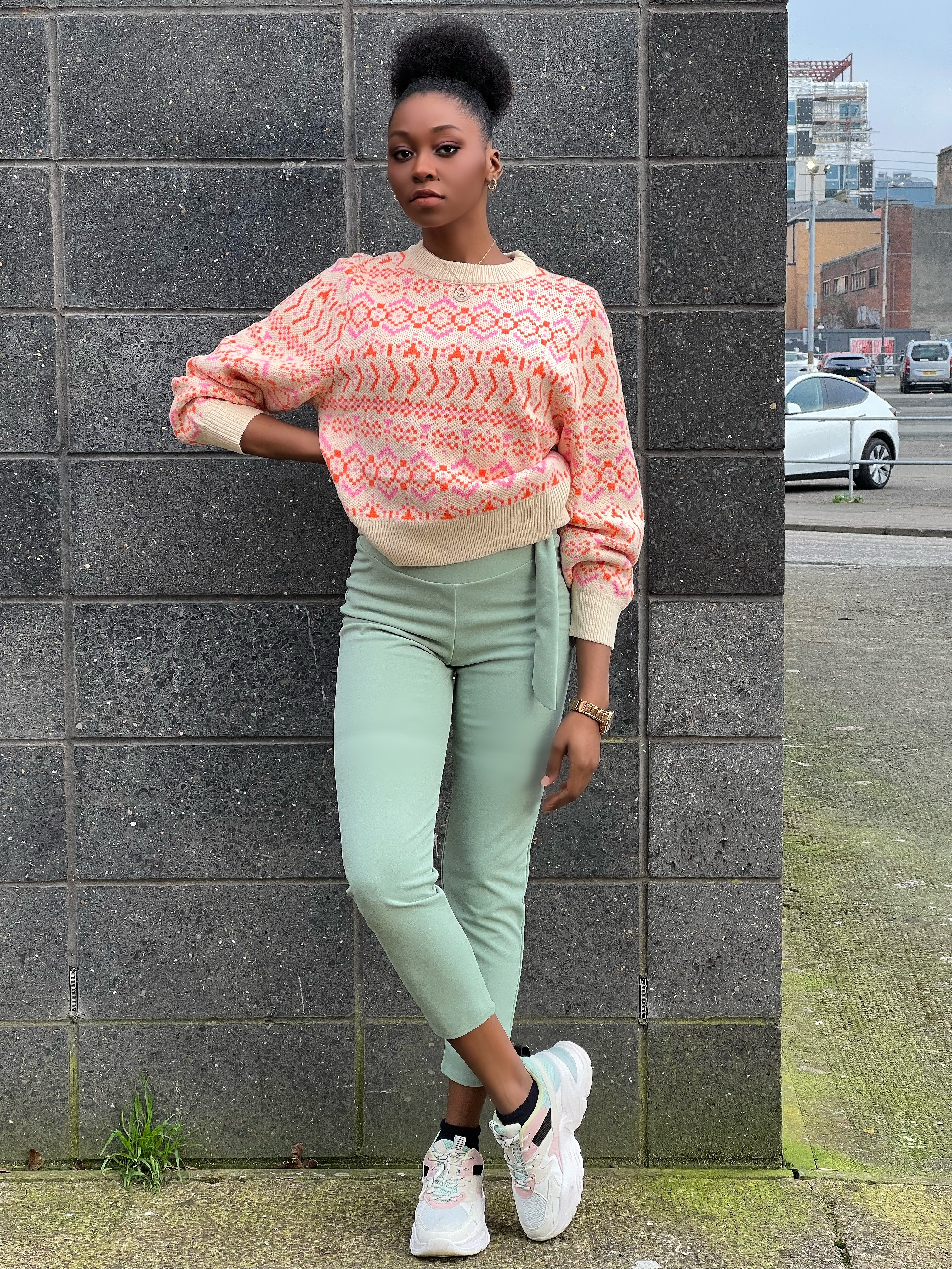 How to style high-waisted pants with a sweater