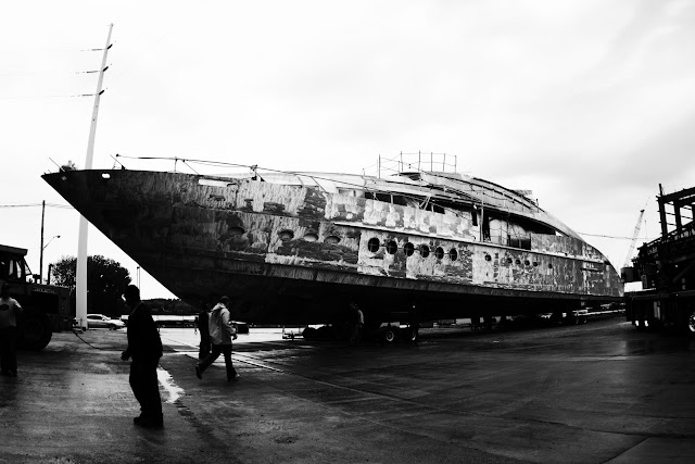 A big boat being rolled around on wheels in Sturgeon, Bay Wisconsin.