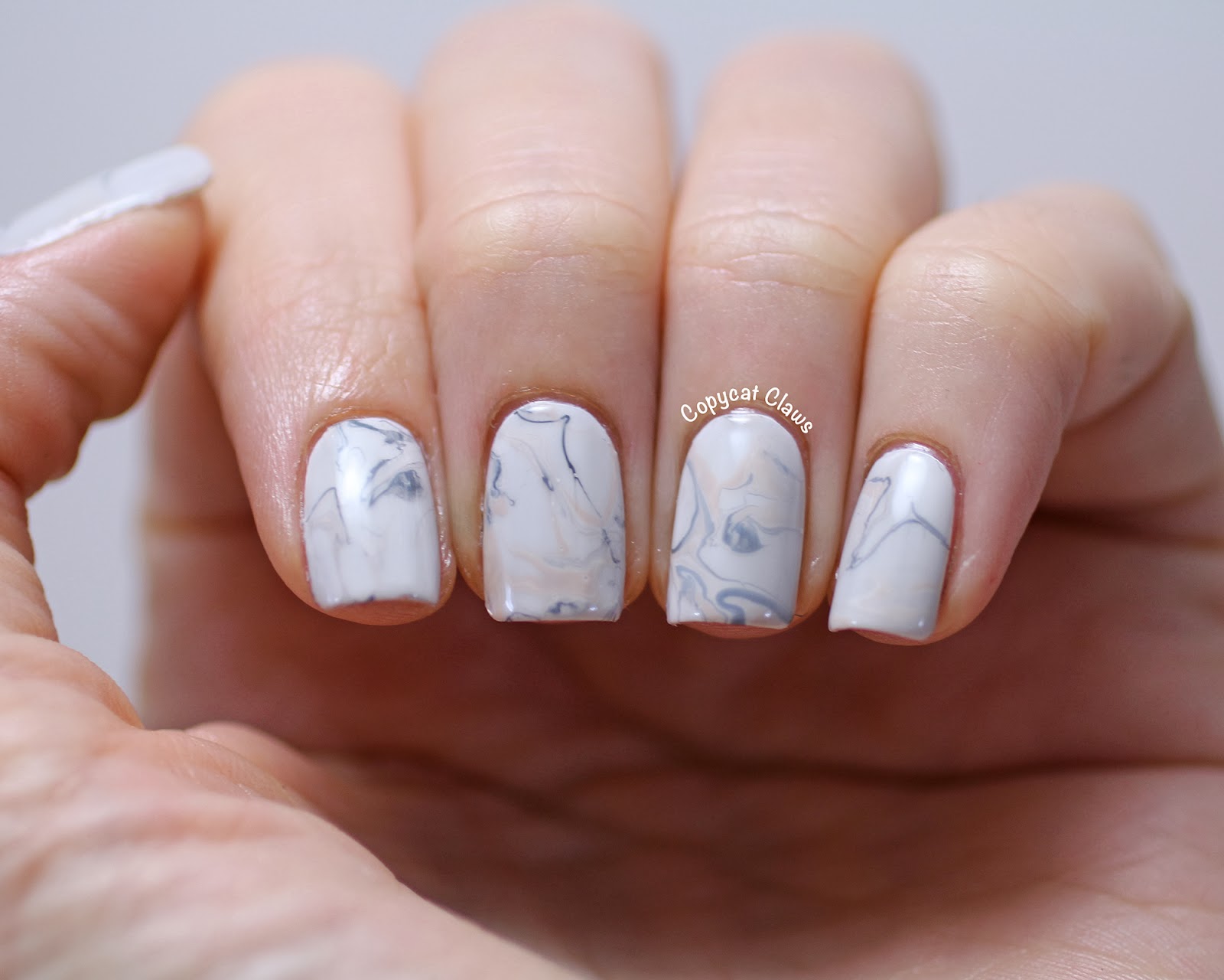 Stylish Nail Art Design Ideas To Wear in 2021 : Marble nails with Gold Lines