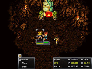 Lucca uses her Napalm Tech on a group of enemies inside the Reptite Lair, a dungeon in Chrono Trigger.