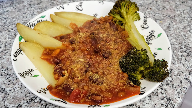 Chilli with chunky chips and roasted broccoli.