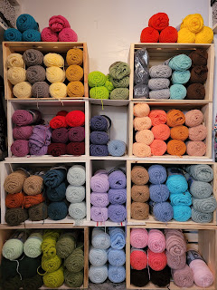 Picture of colorful yarn skeins, a vibrant collection of various hues and textures.