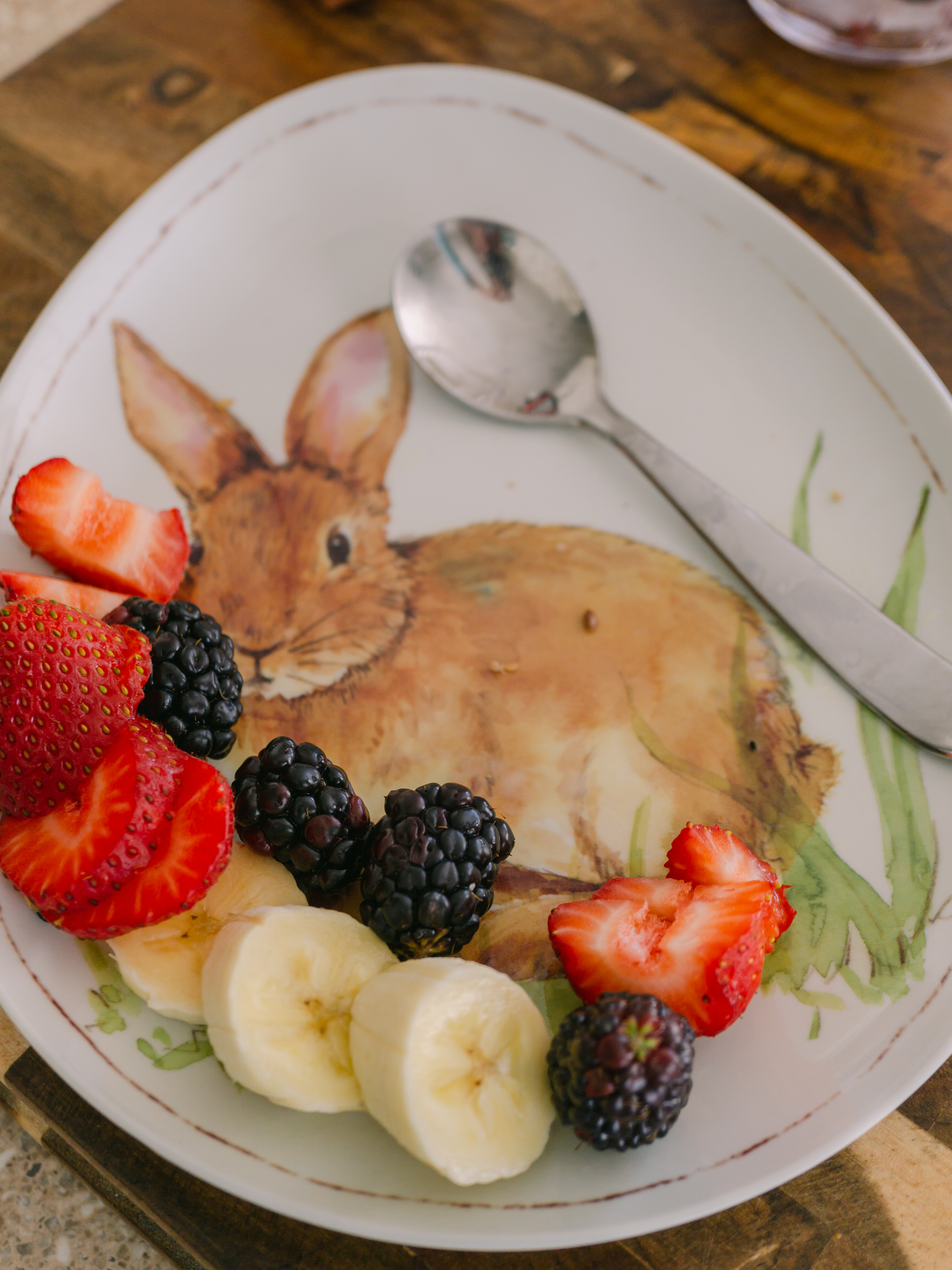 Bunny plate with blackberries and strawberries