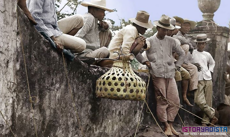 Filipino men selling livestock (c1900s)