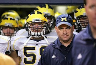 Rich Rodriguez with team competition