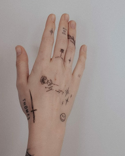 Tatuagens nos dedos - 68 ideias femininas