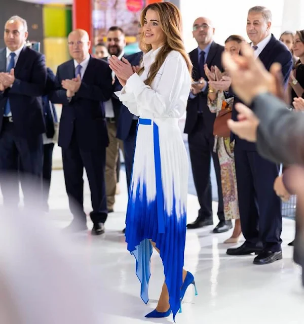 Queen Rania wore AZ Factory with Thebe Magugu Ink Stain Poplin Blouse and Skirt. Technology and Communications Exhibition