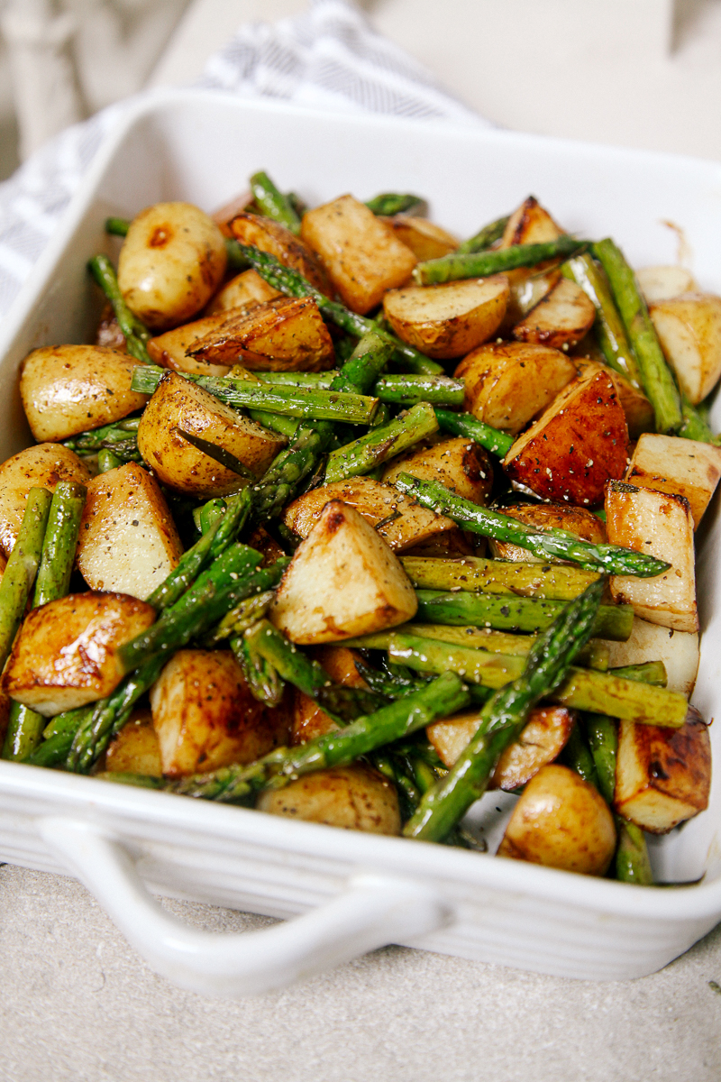Balsamic Roasted New Potatoes with Asparagus - A simple, delicious side dish featuring seasonal asparagus and new potatoes with the subtle sweetness of balsamic vinegar. Balsamic Roasted New Potatoes with Asparagus - A simple, delicious side dish featuring seasonal asparagus and new potatoes with the subtle sweetness of balsamic vinegar.