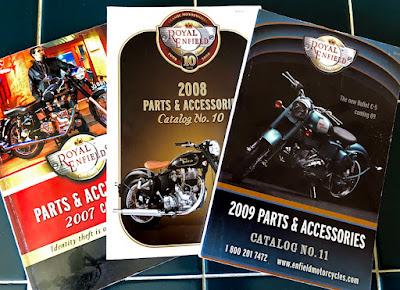 Three Royal Enfield catalogs.