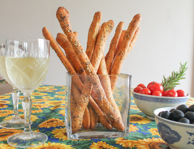 Food Lust People Love: Crunchy and savory, these cheddar poppy seed bread sticks make the perfect munchable for snack time or even happy hour, with a cold glass of beer or wine of any color.