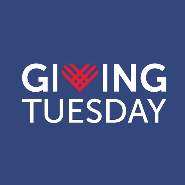 A navy blue image with the white letters Giving Tuesday with the "v" in "Giving" replaced with a red heart.