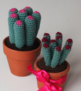 http://www.craftsy.com/pattern/crocheting/home-decor/manycactus-english/57035