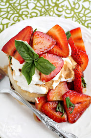 Soft, moist homemade shortcakes are topped with a sweet & tangy strawberry basil topping in these perfect for summer Strawberry Basil Sour Cream Shortcakes.