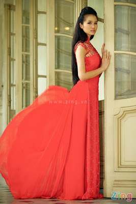 Cao Thuy Duong in red Ao Dai Photos