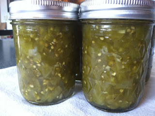 green tomatoes in canning jars