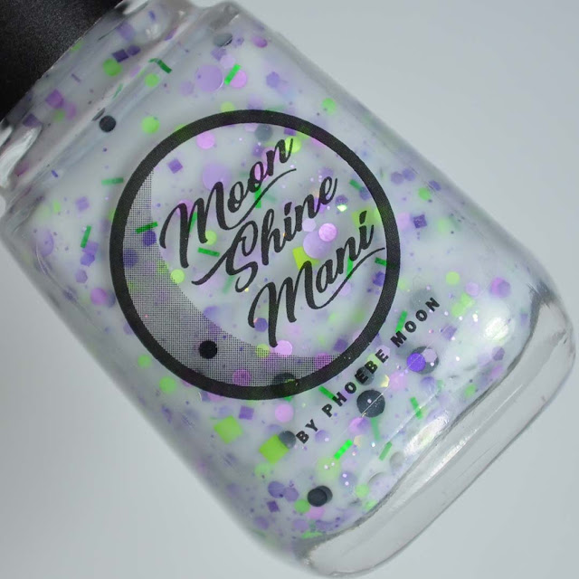 white crelly nail polish with halloween glitter