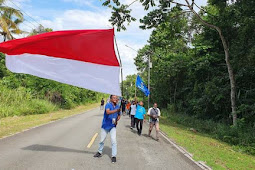Merah Putih Berkibar Bersama Gerakan Mahasiswa Kristen Indonesia di PLBN Skouw
