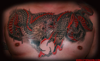 dragon on chest large tattoo