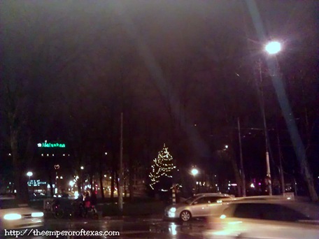 Heineken Brouwerij, Amsterdam. 50 minutes to THE NEW YEAR 2013(Marie Heinekenplein, named after the family name of the world famous beer brewery (a museum now) around NEW YEAR 2013. A lonely Christmas Tree. It’s very busy. I can’t get a clear shot!)