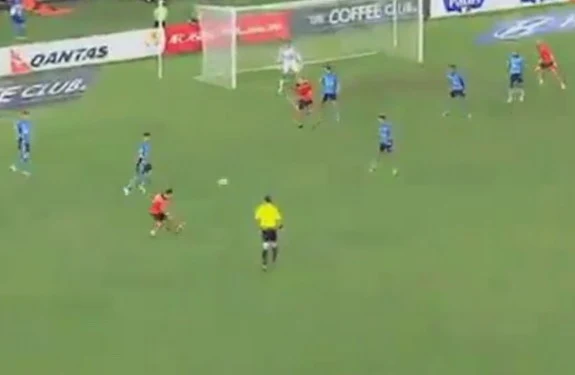 Brisbane Roar player Ivan Franjic scores his team's third goal against Sydney FC