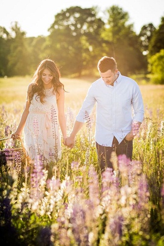 Love Couple Holding Hand in Garden