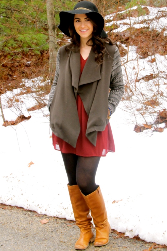Beautiful woman wearing riding boots and tights